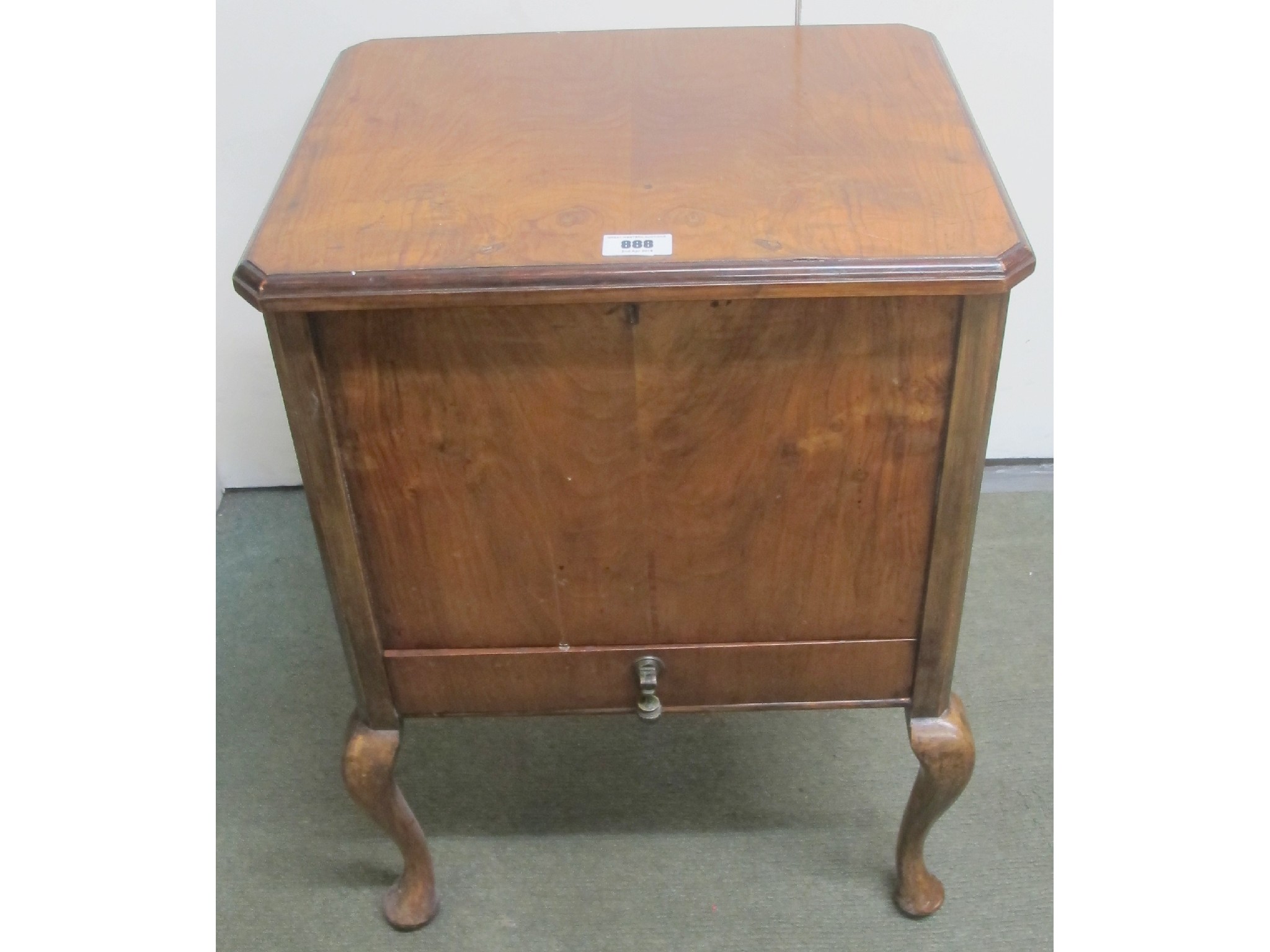 Appraisal: An Edwardian walnut sewing box on cabriole legs