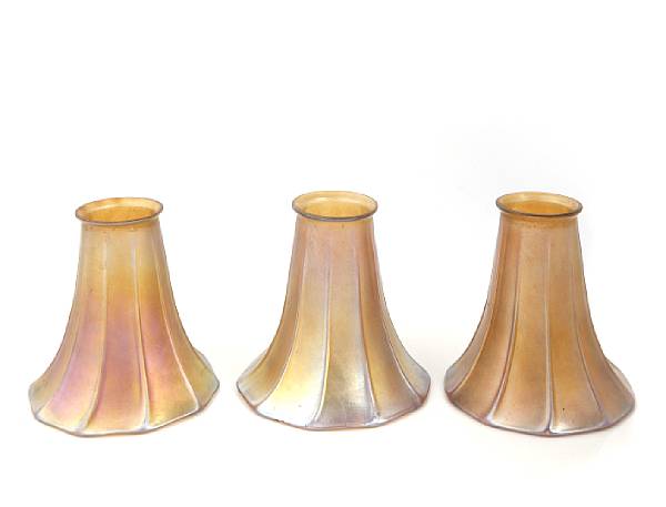 Appraisal: Three American gold iridescent ribbed art glass shades early th