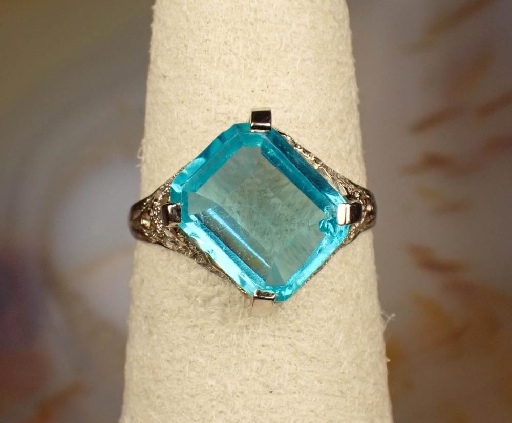 Appraisal: PARAIBA TOURMALINE AND FOURTEEN KARAT GOLD RING The white gold