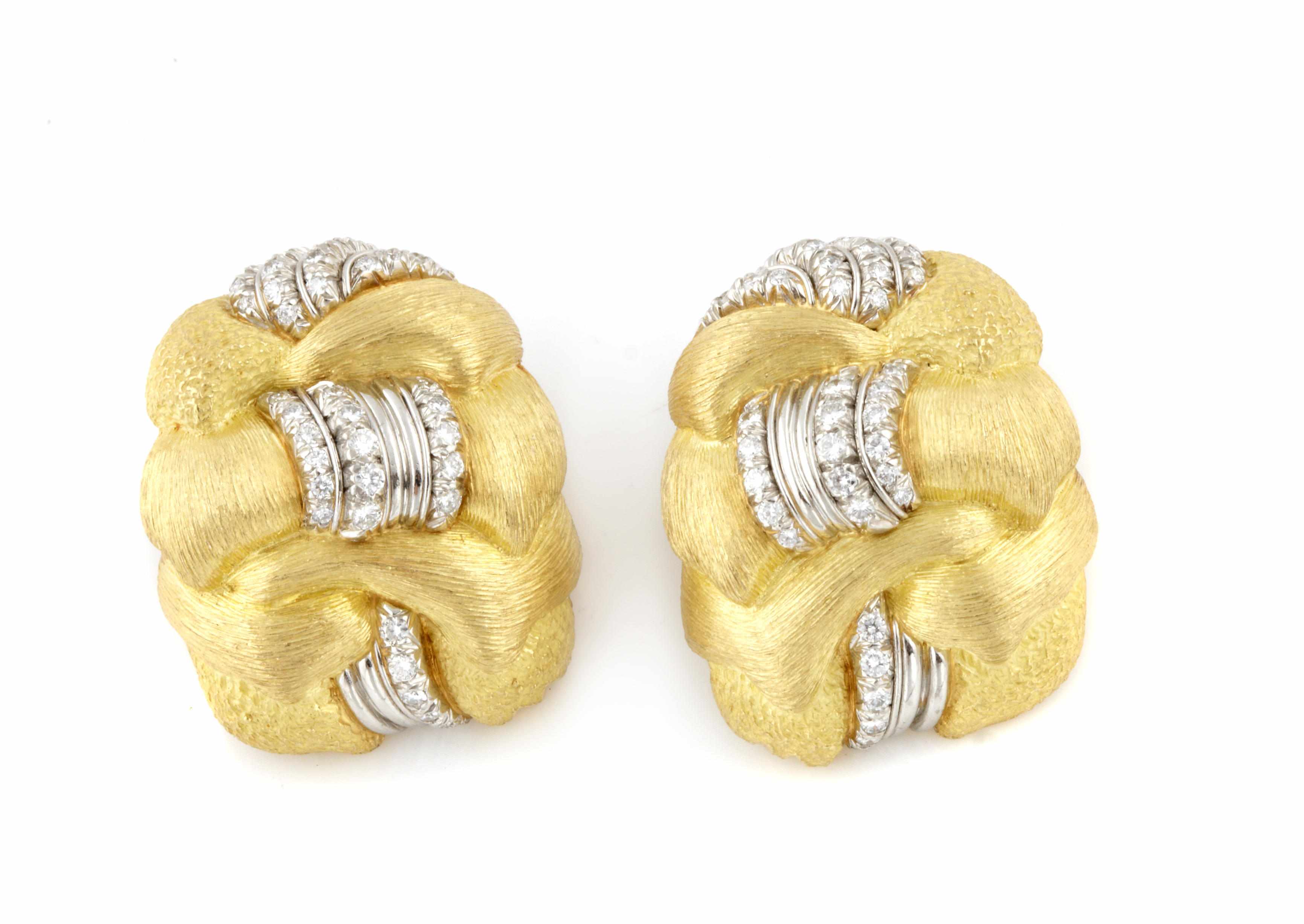 Appraisal: A pair of diamond platinum and k gold earclips each