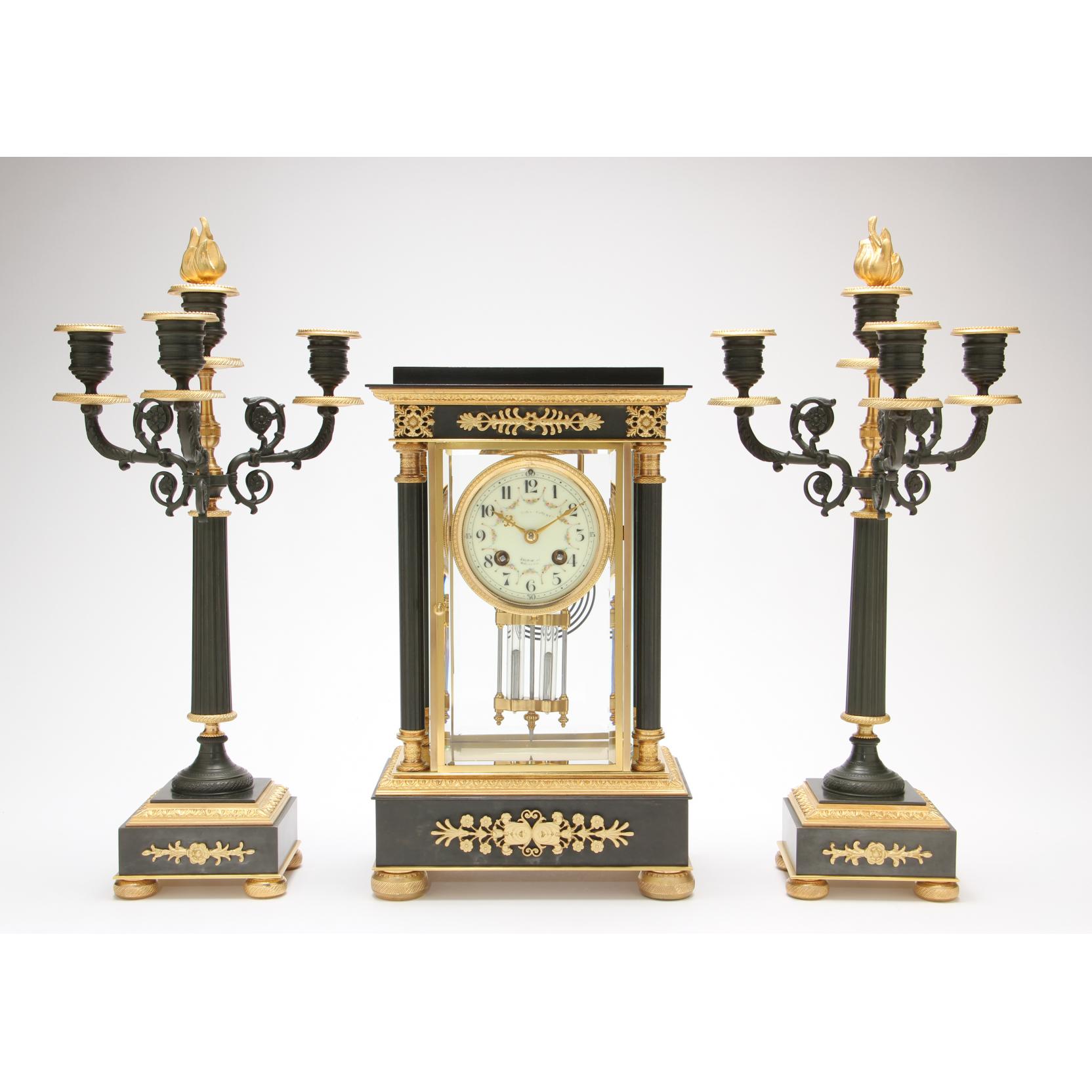 Appraisal: Louis XVI Style French Clock Garniture with Crystal Regulator late