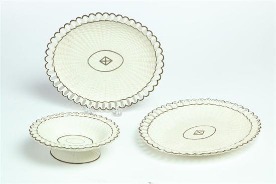 Appraisal: THREE PIECES OF CREAMWARE England early th century softpaste Basketweave