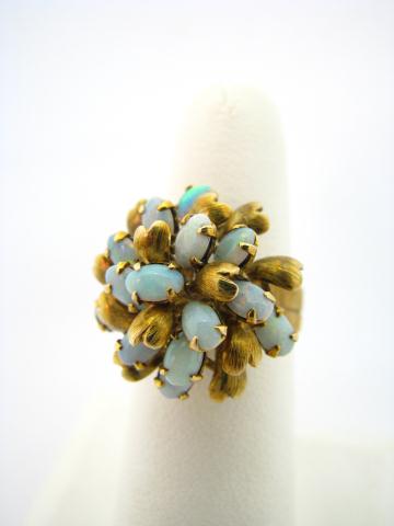 Appraisal: Opal and K Yellow Gold Dinner Ring