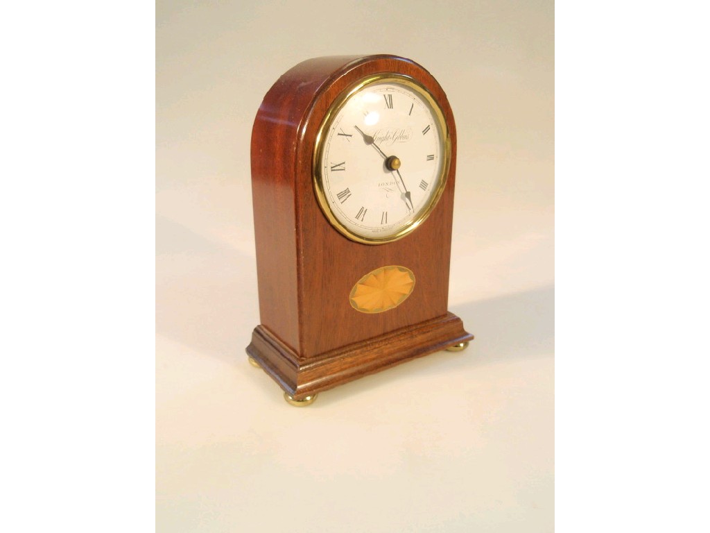 Appraisal: A Knight Gibbons modern mahogany cased table quartz clock in