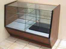 Appraisal: A glass fronted display cabinet x x cm