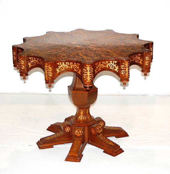 Appraisal: An Italian Renaissance style inlaid walnut table height in width