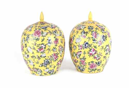 Appraisal: Pair of Chinese porcelain yellow ground covered jars early th