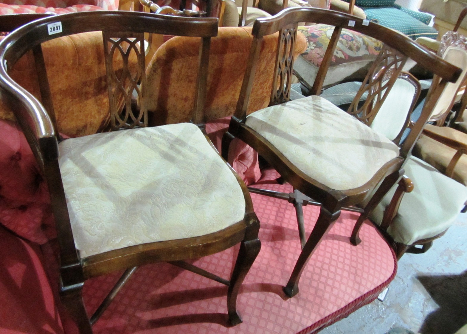 Appraisal: A pair of th century mahogany carver chairs