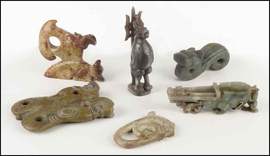 Appraisal: COLLECTION OF STONE CARVINGS Comprised of figures and a buckle