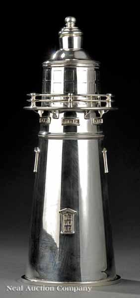 Appraisal: A Silverplate Lighthouse-Form Cocktail Shaker marked J T Co Sheffield