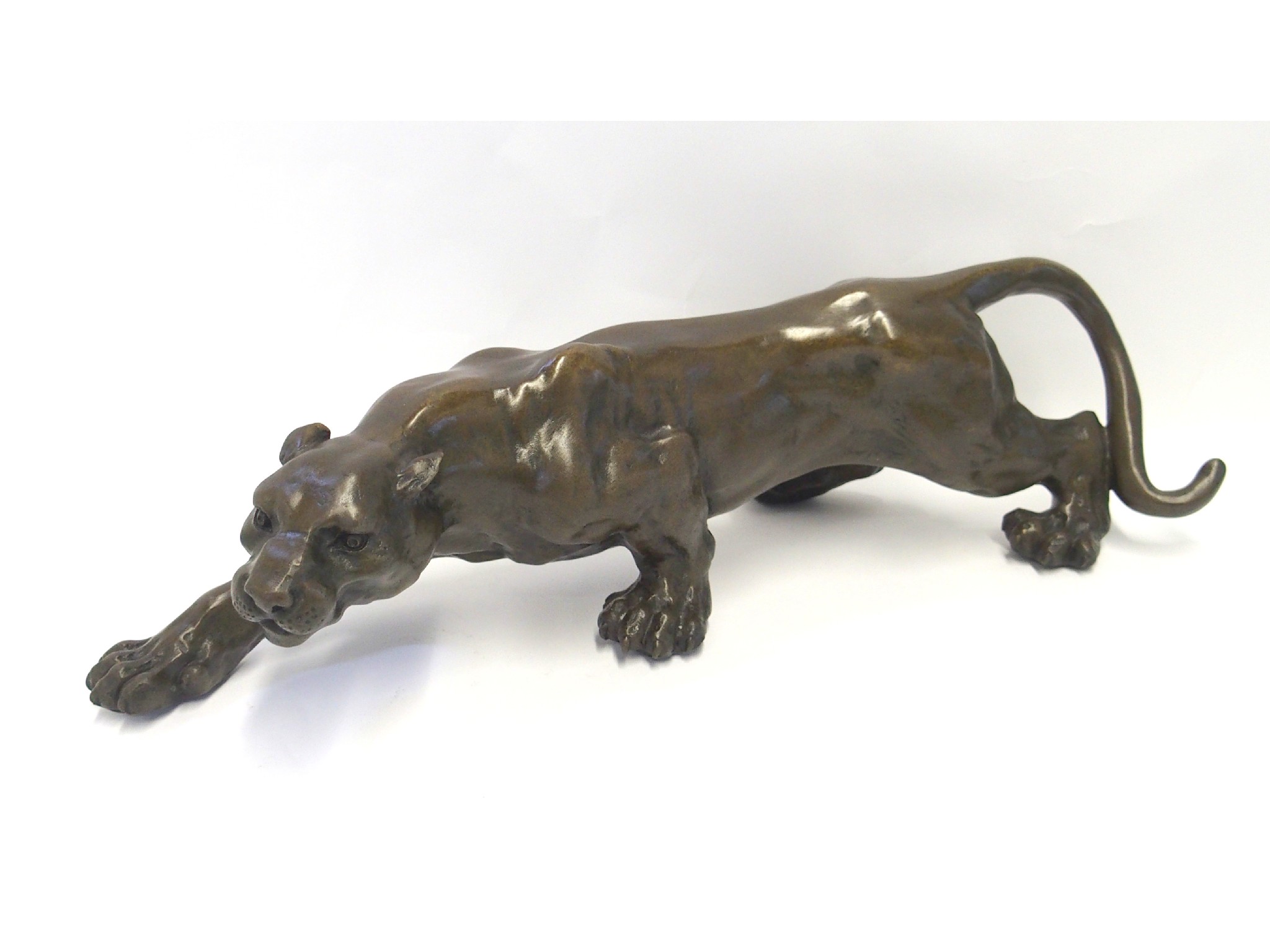 Appraisal: Bronzed metal model of a Panther