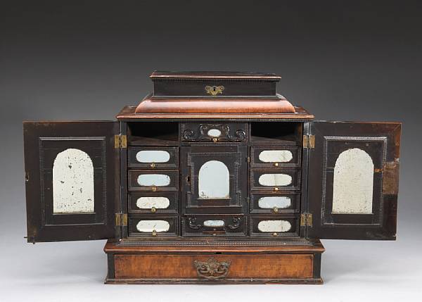 Appraisal: An Italian Baroque walnut table cabinet first quarter th century