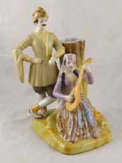 Appraisal: A Russian ceramic spill vase in the form of couple