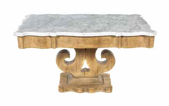 Appraisal: A Victorian Blond Wood Pedestal Table having a shaped white