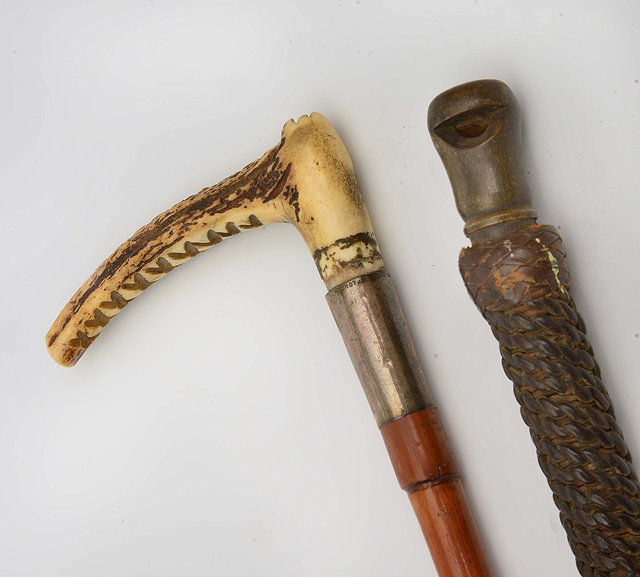 Appraisal: AN EARLY TH CENTURY RIDING CROP with antler handle bamboo