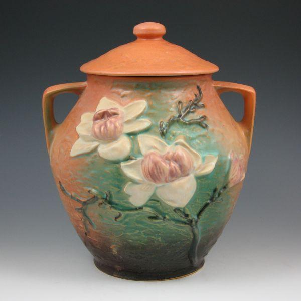 Appraisal: Roseville Magnolia lidded cookie jar in brown Marked Roseville USA