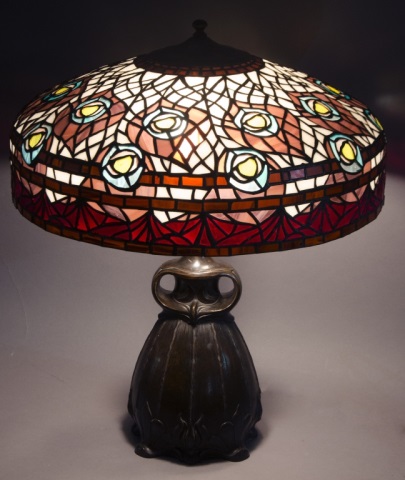 Appraisal: Tiffany Style Stained Glass Bronze Lamp ShadeShade has peacock eye