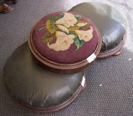 Appraisal: A pair of Victorian circular footstools on compressed bun feet