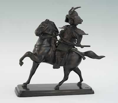 Appraisal: A Japanese Bronze Equestrian Samurai th century made Japanese cast