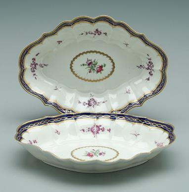 Appraisal: Two Worcester serving dishes cartouche shaped hand painted floral bouquets