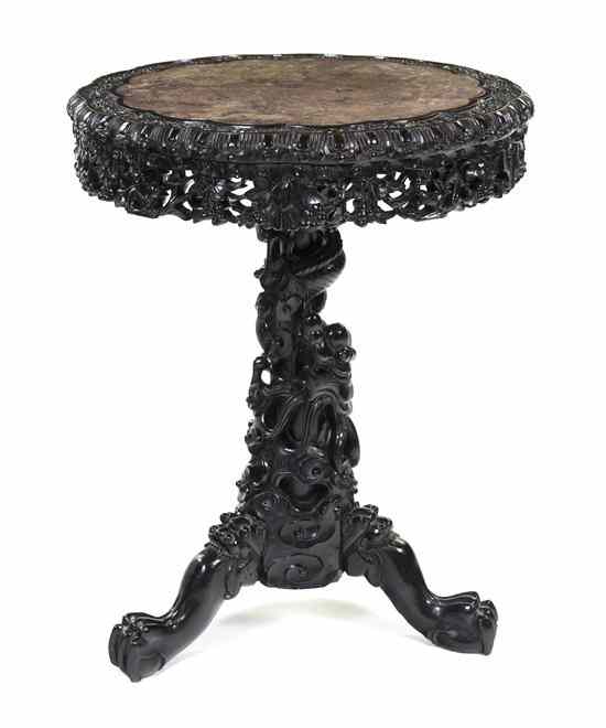 Appraisal: A Chinese Carved Wood Occasional Table having a circular lobed