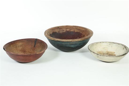 Appraisal: THREE TREENWARE BOWLS American th century Natural surface and two