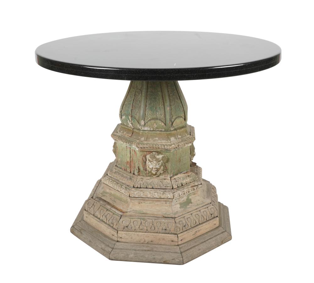 Appraisal: CARVED PAINTED WOOD PEDESTAL TABLEwith later-added round stone top Provenance