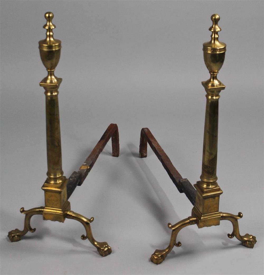 Appraisal: PAIR OF CHIPPENDALE ENGRAVED BRASS ANDIRONS having a brass finial