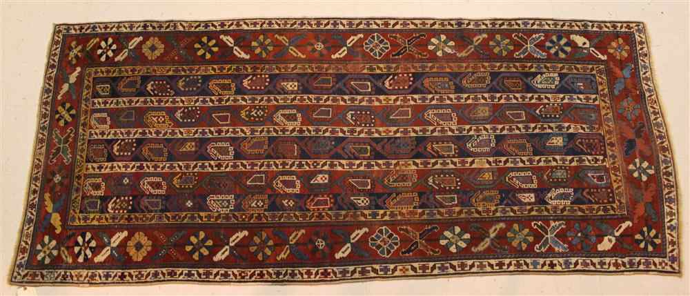 Appraisal: ANTIQUE GENDGE CARPET CAUCASUS with blue teal ivory gold red