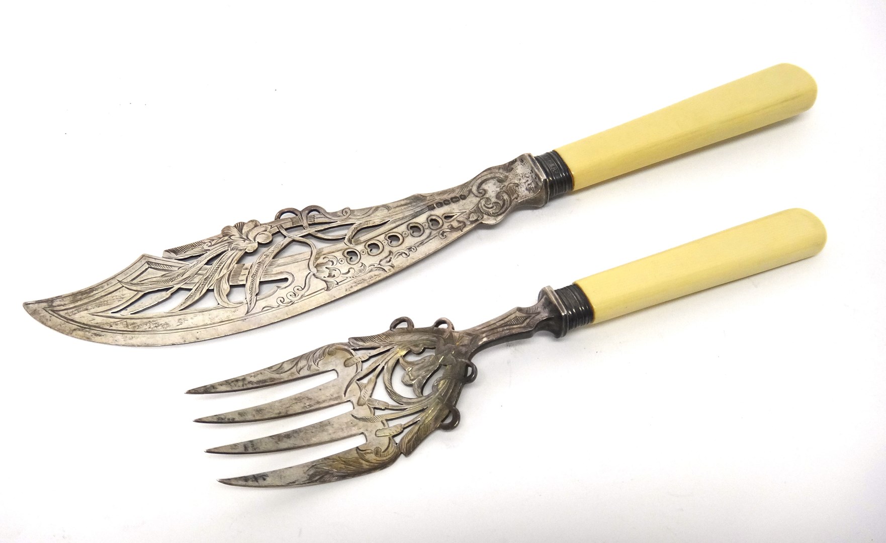 Appraisal: A pair of Victorian silver fish servers with pierced and