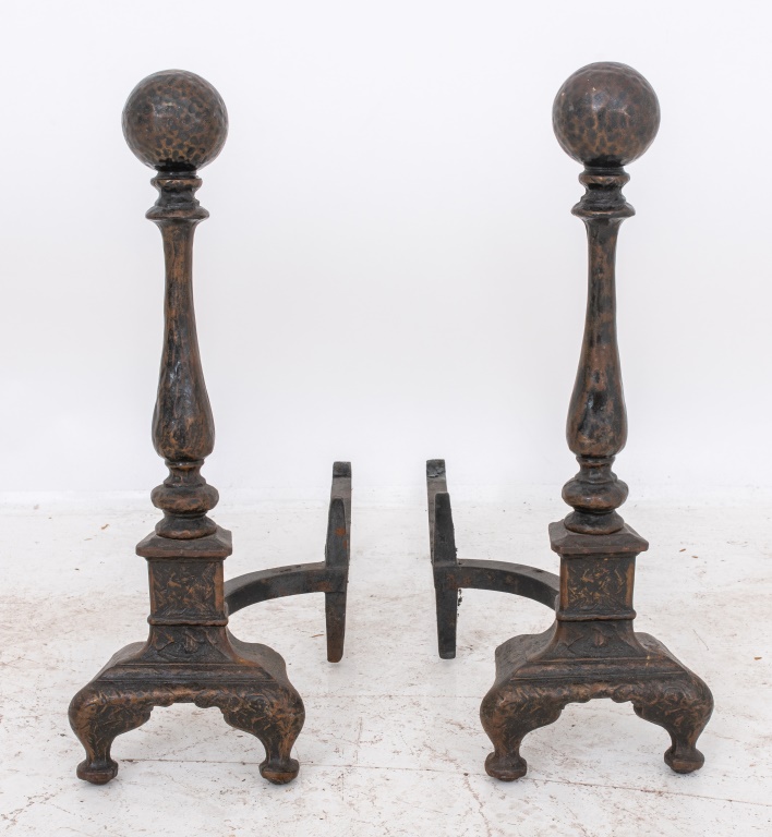 Appraisal: CAST IRON HAMMERED BRASS ANDIRONS PAIR Pair of cast iron