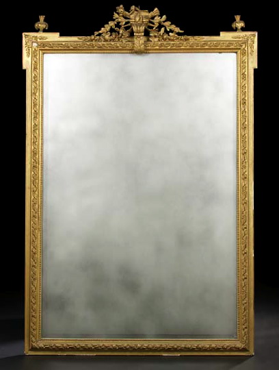 Appraisal: French Carved Giltwood and Plaster Upright Overmantel Mirror in the