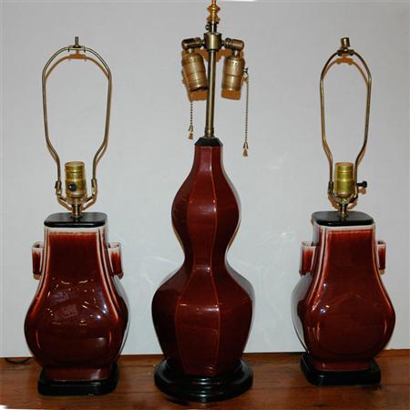 Appraisal: Pair of Chinese Sang de Boeuf Glazed Porcelain Lamps Together