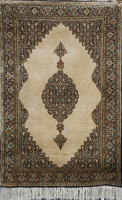 Appraisal: A PERSIAN QUM SILK RUG with a central mihrab on