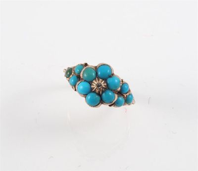 Appraisal: A th Century turquoise cluster ring set in gold Centred