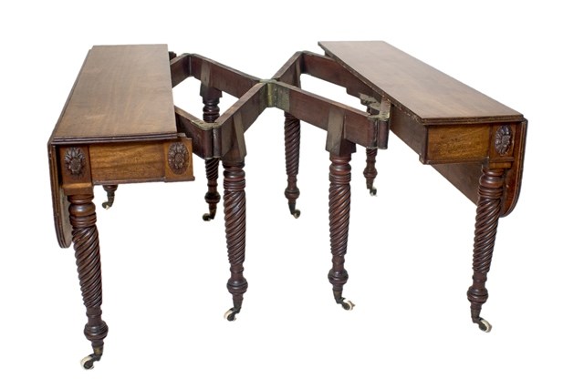 Appraisal: A Regency mahogany drop flap scissor action extending dining table