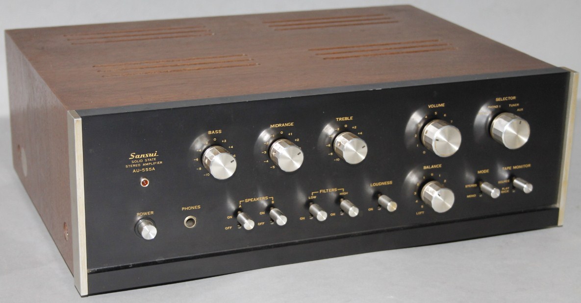 Appraisal: A Sansui stereo amplifier AU- A in wooden surround with