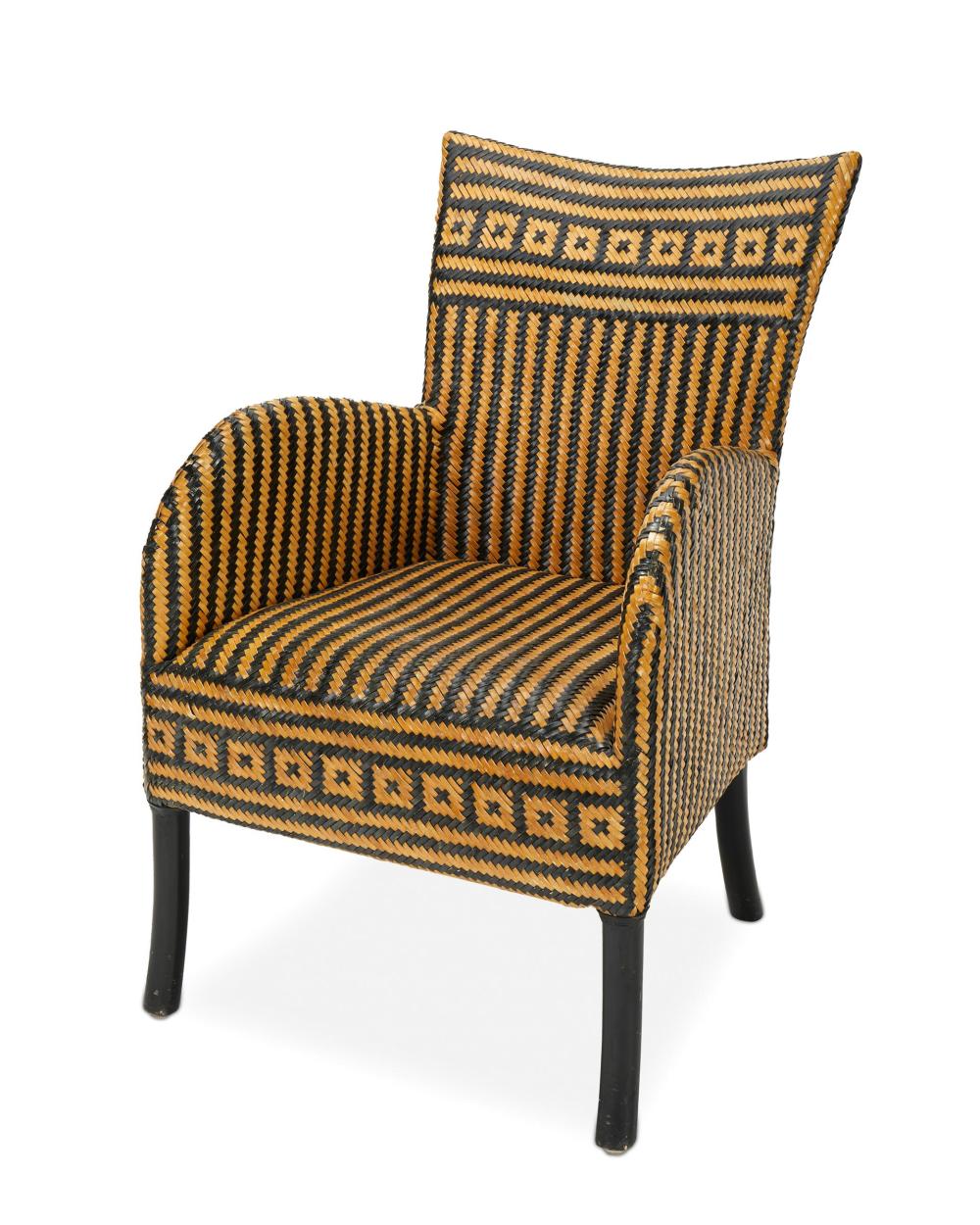 Appraisal: A Palecek woven leather armchair Fourth-Quarter th Century With metal