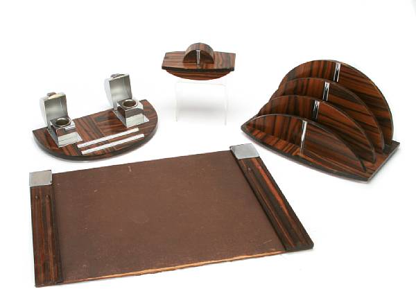 Appraisal: A French Art Deco rosewood and chrome four-piece desk set