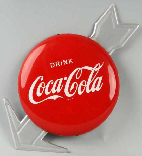 Appraisal: Tin Coca-Cola Button with Silver Arrow Description Two or three