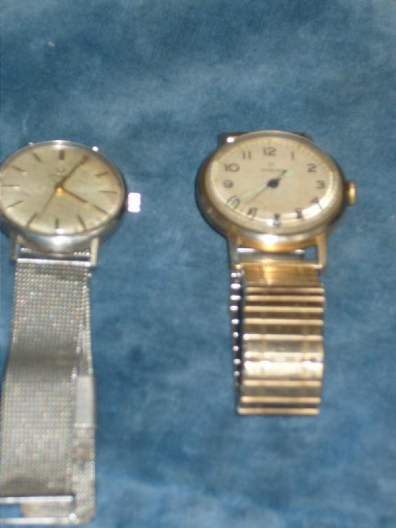 Appraisal: A gentleman's Omega wristwatch movement number together with a gents