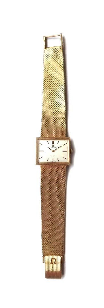 Appraisal: A gold Omega De Ville bracelet wristwatch the signed rectangular