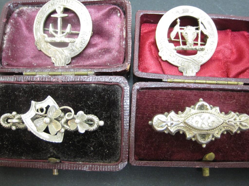 Appraisal: Two silver Brooches one with shield and leaves both cased