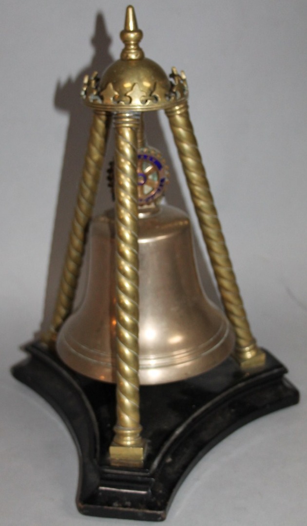 Appraisal: A unusual Rotary Club related table bell the stand with