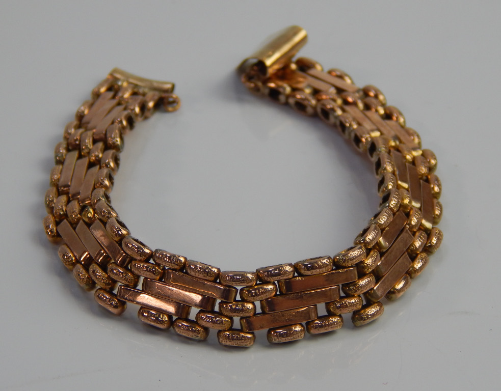 Appraisal: A bracelet in abstract five bar design yellow metal with