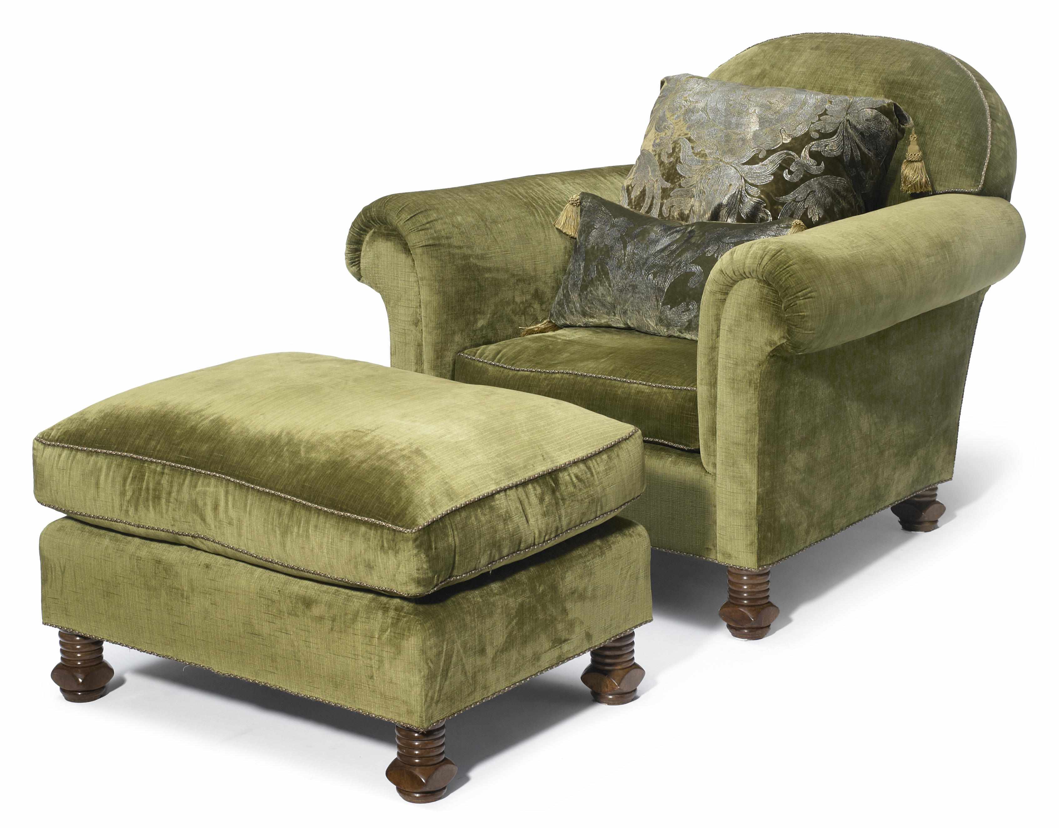 Appraisal: A Rose Tarlow fully upholstered club armchair and foot stool