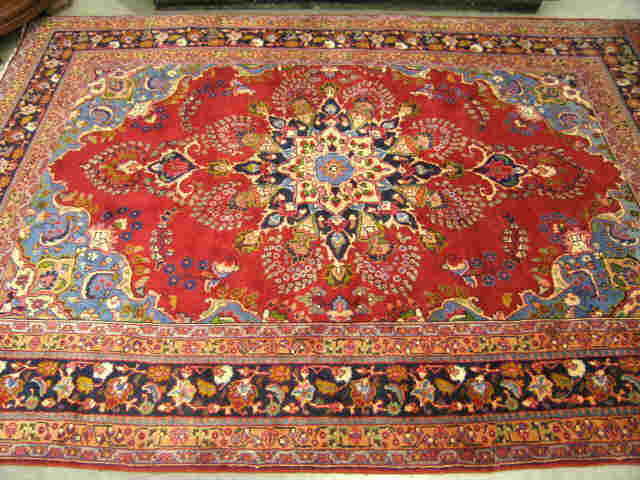 Appraisal: Mashad Persian Handmade Rug central flowering medallion deep rich colors