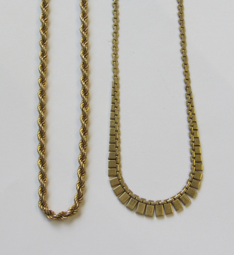 Appraisal: A ct gold rope twist link neckchain on a boltring