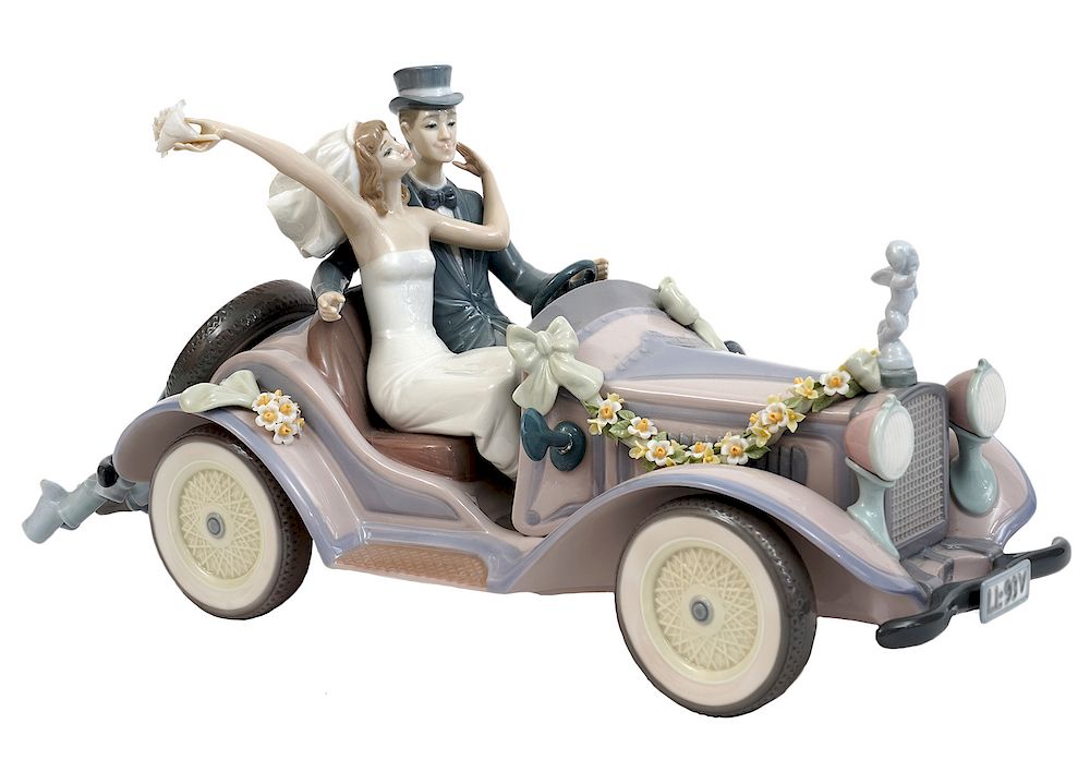 Appraisal: Lladro Rare Retired Honeymoon Car Lladro porcelain rare retired honeymoon