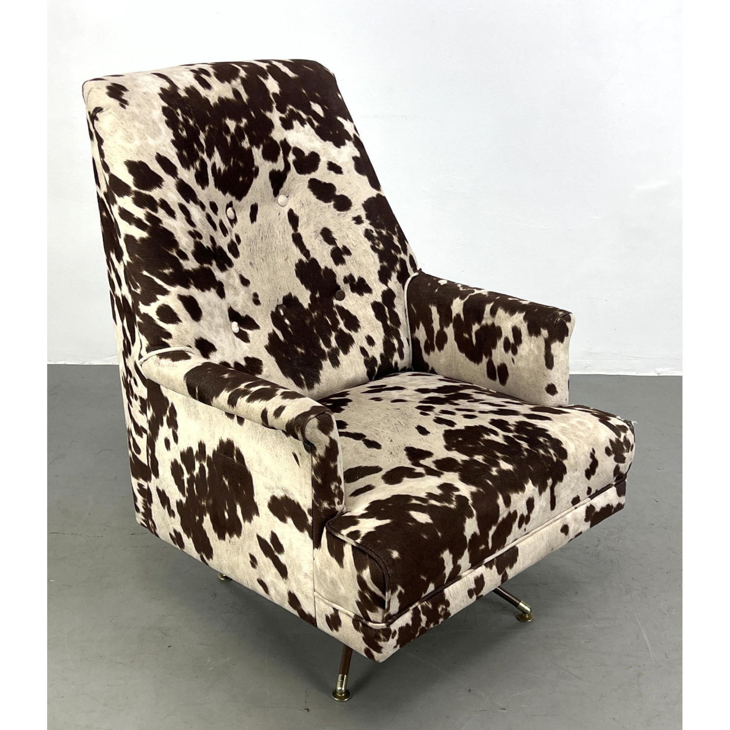 Appraisal: Modernist Swivel Lounge Chair Printed Animal Hide Pattern Upholstery Dimensions